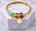Golden Daisy & Music Charm Bracelet – Stainless Steel